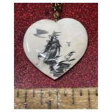 Real New England scrimshaw pendant on gold tone