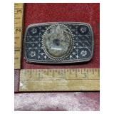 Silver tone belt buckle with polished stone,