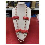 Unique crab necklace with red, white, and gold