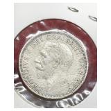 1928 British one-shilling coin
