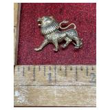 Vintage gold tone lion brooch