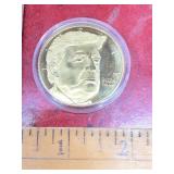 2024 Donald Trump gold tone commemorative coin in