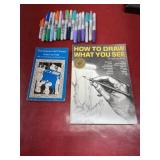 Books and untested Sharpie permanent markers