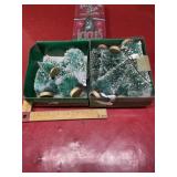 2 boxes of green bottle brush Christmas trees
