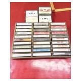 Collection of cassette music with wooden storage
