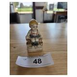 Old Ceramic Seated Woman Statue