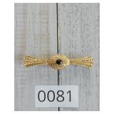Mystique Gold Toned Long Brooch w Center Stone