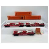 Three postwar Lionel O Gauge 6823 Flat Car with Missile in original box
