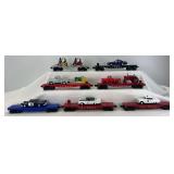 Postwar Lionel O Gauge numbered and unnumbered flat cars with loads