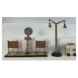 Group of three Spur 1/Gauge One 1932 77/6 Fahrplanstander, Zeitungen and street lamp