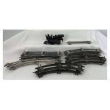 Prewar key wind cast iron O Gauge toy train un-marked 0-4-0 plus Ives 2-rail windup track