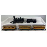 Marx O Gauge No. 1 0-4-0 key wind steam loco and tender, St.P&P 1 baggage, 3 coaches