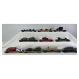 Group of ten HO Scale flat cars with military loads and automobiles