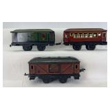 Group of three prewar O Gauge passenger cars one K.B.N. coach