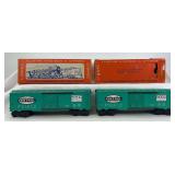 Two postwar Lionel O Gauge 6464-900 NYC New York Central type IV box cars in original boxes