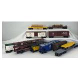 Group of eleven Modern Lionel O Gauge freight trains; box, flat, hopper, auto, machinery, reefer, caboose