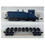 Modern Lionel O Gauge NW-2 diesel switch and custom made wheel car