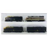 HO Scale group of Erie Lackawanna EL diesel locomotives Mantua FA and FB units and an Athearn GP unit