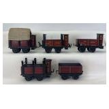 Group of five Karl Bub/Gebruder Bing O Gauge freight wagons stake sides, chains, tarp cover, brakeman