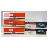 Modern Lionel O Gauge 16600 I.C.G., 16707 SOU, 26883 Weyerhaeuser, 26888 Weyerhaeuser, 26889 Weyerhaeuser dump cars in original boxes