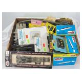 Large group of HO Gauge switches, curved, straight, rail joiners, bridges, piers, bumpers, switch machines