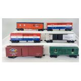 Modern Lionel O Gauge loose freight; 5733, 3086, 9701, 19830, 16740, 9305