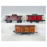 Prewar Lionel O Gauge 806 stock car, 807 caboose, 2672 Pennsylvania caboose