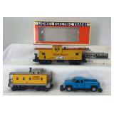 Modern Lionel O Gauge 19706 in box, 8561 and 18424