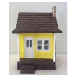 Yellow cement/concrete G Scale one room home with stone chimney accessory building