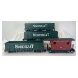 G Scale freight; three Northeast gondolas, one Bachmann Coal Creek Lumber Company bobber caboose