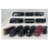 Six Marx O Gauge Commodore Vanderbilt New York Central streamlined 0-4-0 steam locomotives and tenders one red loco, one copper tender
