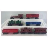 Marx O Gauge 51170, 5543, 249319, 347100, 5586, 18326 and 17858 8-wheel freight trains