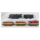 Marx O Gauge 400 0-4-0 steam loco, New York Central tinplate tender, two 241708 Baltimore and Ohio gondolas, 20102 NYC caboose, knuckle couplers
