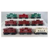 Group of nine Marx O Gauge caboose: NYC Pacemaker; three 18326 Penn Central; three 18326 NYC; Santa Fe; Southern Pacific
