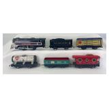 Marx O Gauge Marlines 0-4-0 steam, NYC wedge, 552 C.R.I.&P. gondola, 553 SF tank, 555 C&S reefer, 556 NYC caboose freight train