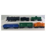 Marx O Gauge 999 0-4-0 die-cast steam NYC locomotive and tender, 51170 Erie gondola, 2532 Cities Service tank, 34178 GN box car, NYC Pacemaker