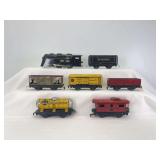 Marx O Gauge electric Commodore Vanderbilt, NYC tender, 552 all red RI gondola, 553 SF yellow, 91453 C&S yellow, 1678 NP General Coal hopper, 694 NYC caboose