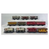 Group of Marx O Gauge 4-wheel 6" freight trains; tank cars, dump car, hoppers, box cars, cabooses eleven total