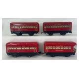 Marx O Gauge; two red Bogota Pullman coaches, red Montclair Pullman coach, red Pullman observation passenger trains