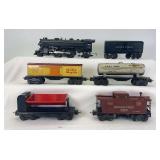 Prewar Lionel O Gauge 1664 2-4-2 steam loco, 1689T tender, 3659 dump, 2680 Sunoco tank, 1679 Baby Ruth, 2757 PRR caboose