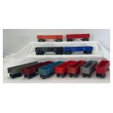 Group of eleven Marx O Gauge Pennsylvania, Erie and Canadian Pacific 8-wheel gondolas with variations