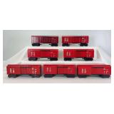 Marx O Gauge 147815 Rock Island RI box cars, seven red, three shades, one Tuscan