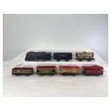 Marx O Gauge streamlined steam windup, NYC tender, 552 RI gondola, 553 SF Middle States, 1678 NP General Coal, 555 C&S red roof refrigerator, 556 NYC caboose