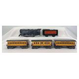 Marx O Gauge 0-4-0 steam loco, Canadian Pacific tender,  StP&P passenger cars No. 1, and two No. 3