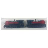 Two Marx O Gauge 799 Rock Island diesel switcher locomotives, both powered