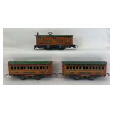 Prewar Winner Lines O Gauge 1010 box cab electric locomotive, two 1011 Pullman passenger coaches tinplate lithographed trains
