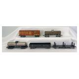 Marx O Gauge 3/16" 8-wheel freight: NKP2700 flat w/stakes, 3552 NKP gondola, two 256 Niacet tanks, 355 AT&SF 13549 stock car
