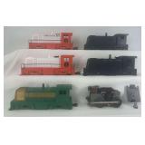 Marx O Gauge diesel locomotive shells 588, 702, 588, two ICG switcher, one electric motor