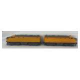 Postwar Lionel O Gauge 2023 Union Pacifc Alco diesel locomotive A units in gray and yellow powered and dummy