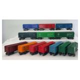 Group of thirteen Marx O Gauge 8-wheel box cars and double door automobile car